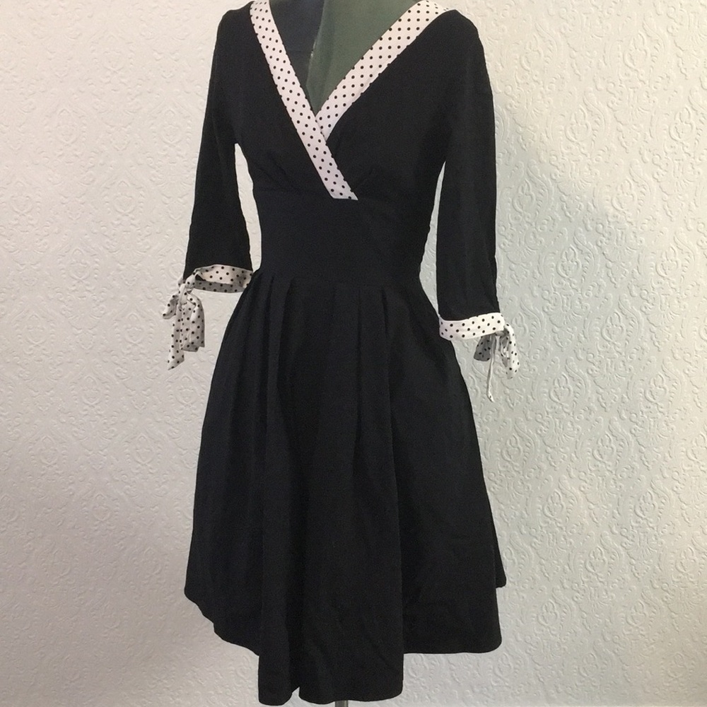 1950s style black swing dress w/ polka dot detail